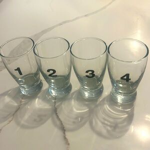 Wemco numbered 1,2,3,4 shot glasses 4" tall 2.25" across top Set of 4